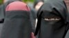 سوئٹزرلینڈ: عوامی مقامات پر برقعے پر پابندی کا فیصلہ، مسلم تنظیموں کی مذمت 