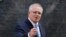 FILE - Australia's Prime Minister Scott Morrison gestures as he leaves 10 Downing street in central London on June 15, 2021.