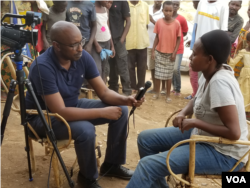 Voice of America reporter Edward Rwema interviews Jacqueline Nduwayezu , 47-year-old mother of six in Mahama Refugee camp, which is home to more than 54,000 Burundian refugees in easter Rwanda.