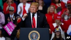 President Donald Trump speaks during a rally in Grand Rapids, Mich., March 28, 2019.