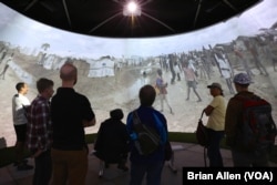 Forced From Home uses interactive media, such as this 360-degree video, to depict the humanitarian work being done by Doctors Without Borders. (B. Allen/VOA)