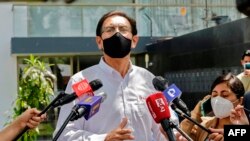 Peruvian former president Martin Vizcarra, impeached and ousted over corruption allegations, talks to the press outside his home in Lima on Nov. 15, 2020.