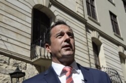 John Steenhuisen, the leader of South African main political opposition party, arrives ahead of the State of the Nation address by Cyril Ramaphosa, the President of South Africa, at the Parliament in Cape Town on Feb. 13, 2020.