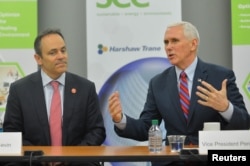 Vice President Mike Pence, sitting with Kentucky Governor Matt Bevin, discusses the Republican replacement for the Affordable Care Act during a meeting with local business leaders in Louisville, Kentucky, March 11, 2017.