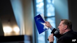 FILE - The Rev. Michael Pfleger speaks during the Rev. Martin Luther King Jr. commemorative service at Ebenezer Baptist Church, Jan. 16, 2017, in Atlanta.