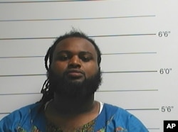 A photo provided by the Orleans Parish Sheriff's Office shows Cardell Hayes, whom police have charged with second-degree murder in the shooting death Saturday of former New Orleans Saints defensive end Will Smith.