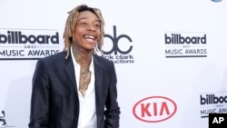 Wiz Khalifa arrives at the Billboard Music Awards at the MGM Grand Garden Arena, May 17, 2015, in Las Vegas. 