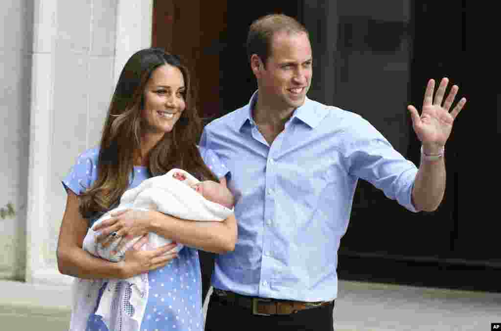 Britain's Prince William and his wife Kate hold the Prince of Cambridge, July 23, 2013, outside the exclusive Lindo Wing at St. Mary's Hospital in London where the Duchess gave birth.
