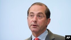 FILE- In this Oct. 26, 2018, file photo Health and Human Services Secretary Alex Azar speaks about proposed reforms to Medicare Part B drug pricing policies at the Brookings Institute in Washington. 