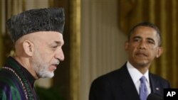 Barack Obama et Hamid Karzai en 2013.