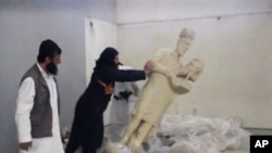 A five-minute video from the Islamic State group purports to show militants destroying ancient artifacts in Iraq’s Mosul Museum. It was released Feb. 26, 2015.