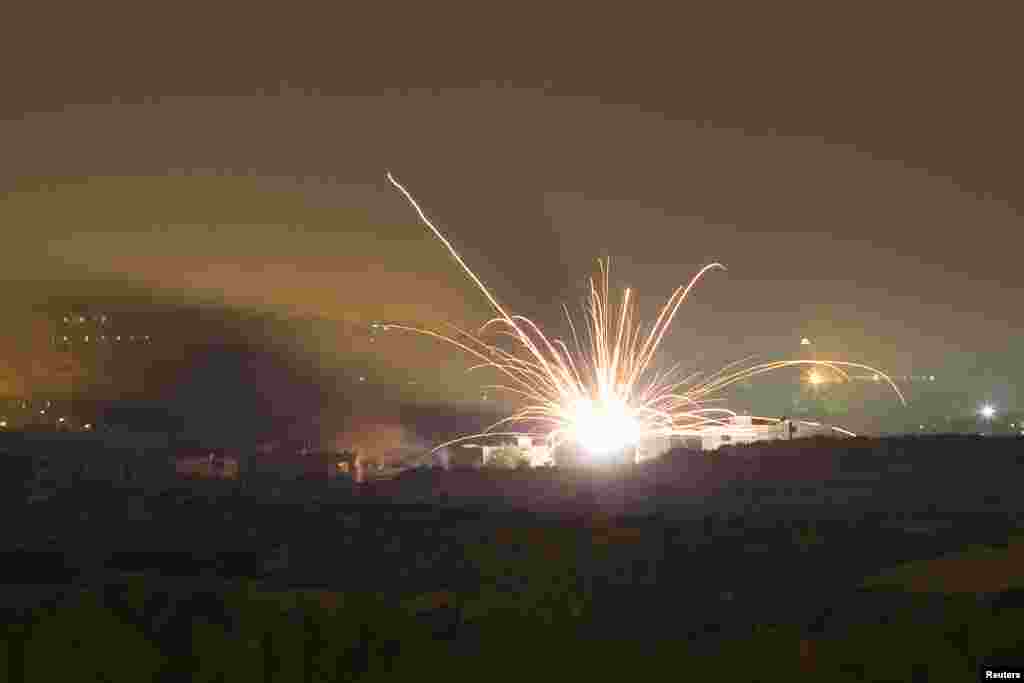 An Israeli rocket is fired into the northern Gaza Strip, July 17, 2014. 