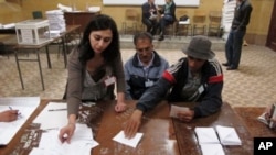 Workers at a polling station count ballots in the Bab el-Oued neighborhood in Algiers, May 10, 2012.