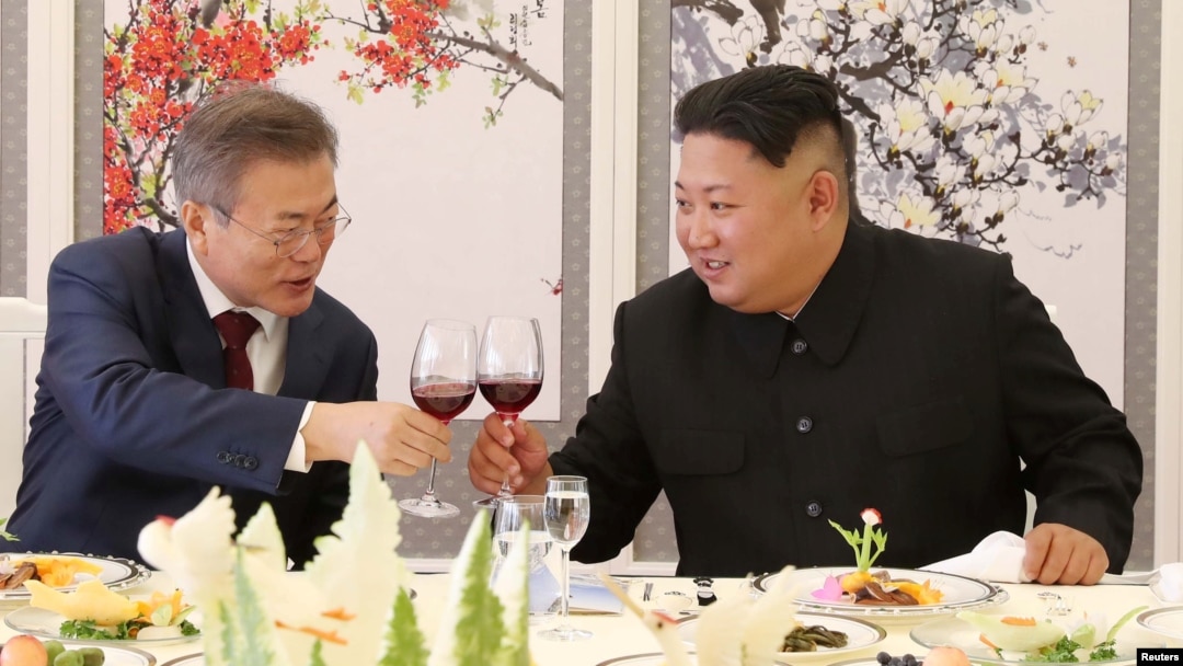 FILE - South Korean President Moon Jae-in makes a toast with North Korean leader Kim Jong Un during a luncheon at Samjiyon Guesthouse in Ryanggang province, North Korea, Sept. 20, 2018.