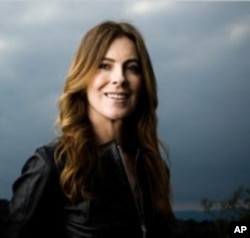 "The Hurt Locker" director Kathryn Bigelow receives the award for Best Director 50 and over.