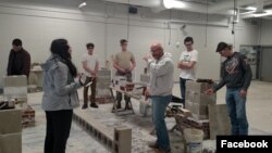 High school students from the Waterloo Community School District take part in construction traning at their school. The students spent five days at their school learning from experienced workers from the Masonry Institute of Iowa. (Masonry Institute of Io