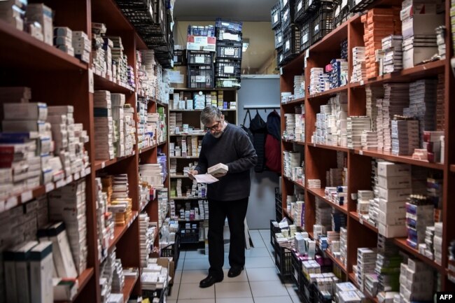 Volunteer-staff classify medicines in the store of the social pharmacy of Elliniko, Feb. 27, 2019.