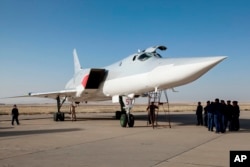 A Russian Tu-22M3 stands on the tarmac at an air base near Hamedan, Iran, Aug. 15, 2016.