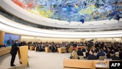 U.N. Secretary-General Antonio Guterres (L) delivers a speech at the opening day of the 40th session of the United Nations Human Rights Council, Feb. 25, 2019 in Geneva, Switzerland. 