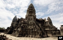 FILE - Cambodia's famed Angkor Wat ancient Hindu temple complex stands in Siem Reap province, some 230 kilometers (143 miles) northwest Phnom Penh, Cambodia, June 28, 2012.