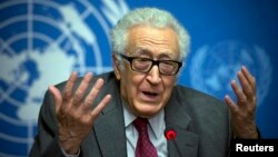 FILE - U.N. mediator for Syria Lakdar Brahimi gestures during a press briefing at the United Nations headquarters in Geneva, Switzerland, January 2014.