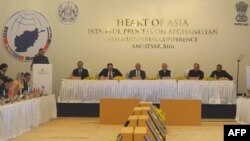 Indian Prime Minister Narendra Modi (C), Afghan President Ashraf Ghani (8L), Indian Finance Minister Arun Jaitley (2R) and Indian Union Minister VK Singh (R) listen to a speaker at the 6th Heart of Asia (HoA) Ministerial Conference in Amritsar, India.