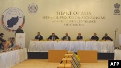 Indian Prime Minister Narendra Modi (C), Afghan President Ashraf Ghani (8L), Indian Finance Minister Arun Jaitley (2R) and Indian Union Minister VK Singh (R) listen to a speaker at the 6th Heart of Asia (HoA) Ministerial Conference in Amritsar, India, Dec