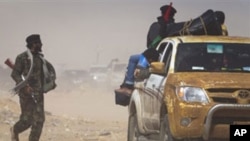 Libye : les forces pro-Kadhafi repoussent l’avancée des rebelles