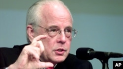 FILE - John Dean, former White House counsel to President Richard M. Nixon, addresses the Presidential Tapes Conference at the John F. Kennedy Library and Museum, Feb. 17, 2003, in Boston. Dean will offer testimony in Supreme Court confirmation hearings for Brett Kavanaugh.