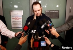 Joshua Boyle speaks to the media after arriving with his wife and three children at Toronto Pearson International Airport, nearly five years after he and his wife were abducted in Afghanistan in 2012 by the Taliban-allied Haqqani network, in Toronto, Oct.