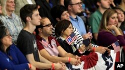 Supporters watch as Democratic presidential candidate Hillary Clinton speaks during a rally at Cuyahoga Community College, in Cleveland, March 8, 2016.