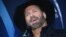 Musician Garth Brooks speaks in the press room after winning the award for entertainer of the year at the 51st annual CMA Awards at the Bridgestone Arena, Nov. 8, 2017, in Nashville, Tennessee.