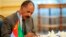 FILE - Eritrean President Isaias Afwerki signs a peace accord with Ethiopia in Jiddah, Saudi Arabia on Sunday, Sept. 16, 2018. 