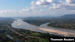FILE - A view of the Mekong River bordering Thailand and Laos is seen from the Thai side in Nong Khai, Thailand, Oct. 29, 2019. 