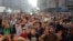 Syrians gather in a street in the northern city of Aleppo on Aug. 6, 2016, in celebrations after rebels said they have broken a three-week government siege on Syria's second city. 