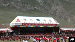 Tibetan dancers at the Lithang Horse Festival, August 1,2007. on the day Runggye Adak made his protest.