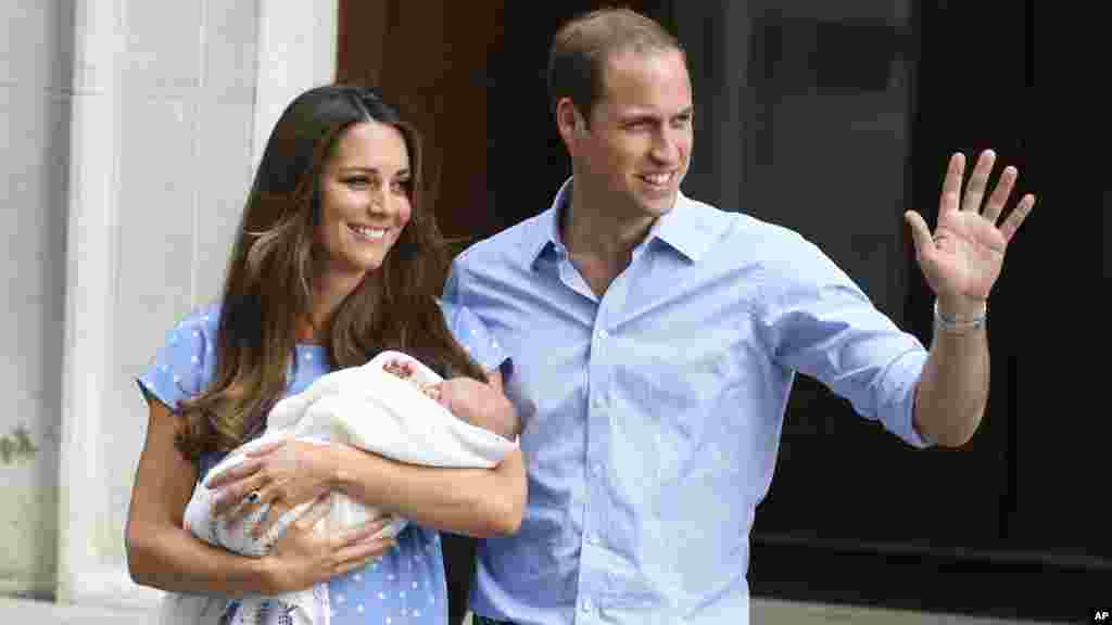 Britain's Prince William and his wife Kate hold the Prince of Cambridge, July 23, 2013, outside the exclusive Lindo Wing at St. Mary's Hospital in London where the Duchess gave birth.