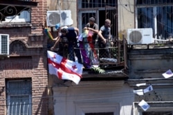 Protesters break into Tbilisi Pride offices during Pride Week in Tbilisi, Georgia, July 5, 2021.