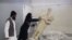 A five-minute video from the Islamic State group purports to show militants destroying ancient artifacts in Iraq’s Mosul Museum. It was released Feb. 26, 2015.