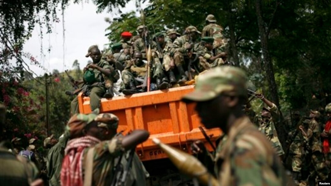 M23 rebels sit in a vehicle as they withdraw from the eastern Congo town of Goma, Dec. 1, 2012 (file photo).