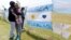 Relatives and friends of Alejandro Damian Tagliapietra, one of the 44 crew members of the ARA San Juan submarine, react outside an Argentine naval base in Mar del Plata, Argentina, Nov. 24, 2017. The banner reads "Camarades, be strong."