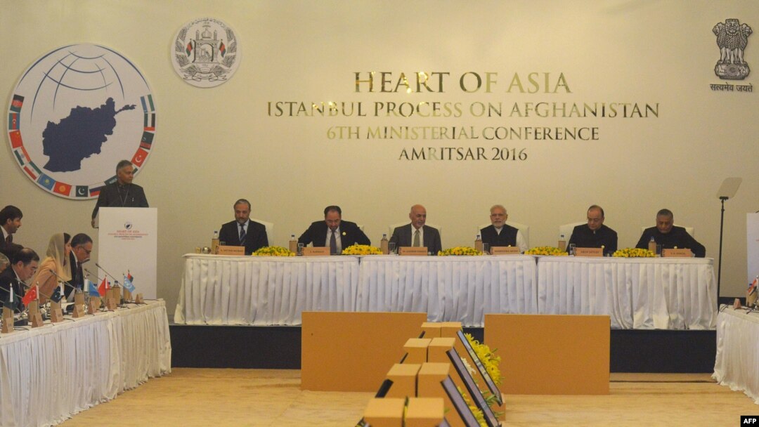 Indian Prime Minister Narendra Modi (C), Afghan President Ashraf Ghani (8L), Indian Finance Minister Arun Jaitley (2R) and Indian Union Minister VK Singh (R) listen to a speaker at the 6th Heart of Asia (HoA) Ministerial Conference in Amritsar, India, Dec