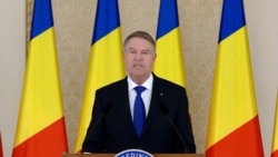 Presiden Rumania Klaus Iohannis menyampaikan pidato dan mengumumkan pengunduran dirinya di Bucharest, Rumania, 10 Februari 2025, dalam cuplikan layar dari video yang dirilis oleh Kepresidenan Rumania. (Kepresidenan Rumania via Reuters)