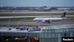 A United Airlines plane lands at O'Hare International Airport in Chicago, Illinois, April 11, 2017.