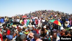 Striking miners evicted from company housing at a gold mine occupy a hill near the mine in Carltonville, west of Johannesburg October 2, 2012.