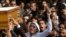 Relatives and colleagues of Mohammed Reda, 19, an Egyptian student who was killed Thursday during clashes with security forces near Cairo University, chant slogans as they carry a coffin following Friday prayers in Cairo, Egypt, Friday, Nov. 29, 2013.