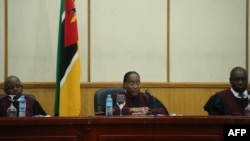 Mozambican Consitutional Council President Lucia Ribeiro (C) announce the results of the 2024 presidential elections in Maputo on December 23, 2025.