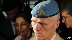 UN-appointed Norwegian Major General Robert Mood talks to the media after his arrival at Damascus airport, April 29, 2012.