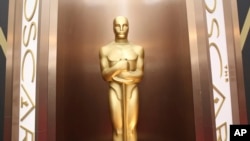 FILE - An Oscar statue is displayed at the Oscars at the Dolby Theatre in Los Angeles.