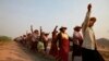 FILE - Villagers rally against land seizures for a copper mine project at Lapdaung Hill, in Sarlingyi township, Myanmar, March 13, 2013.